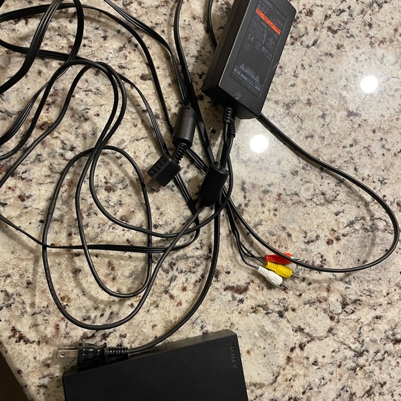 PlayStation 2 with 2 controllers and wires - Picture 1 of 2